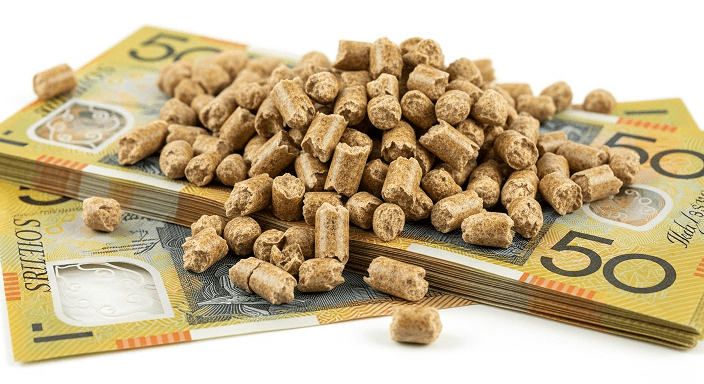 pellet heater runnings costs wood pellets on top of australian bank notes