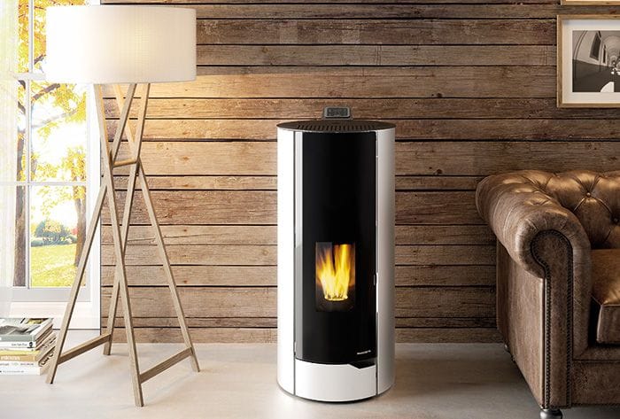Palazzetti Melita pellet heater in front of a wall